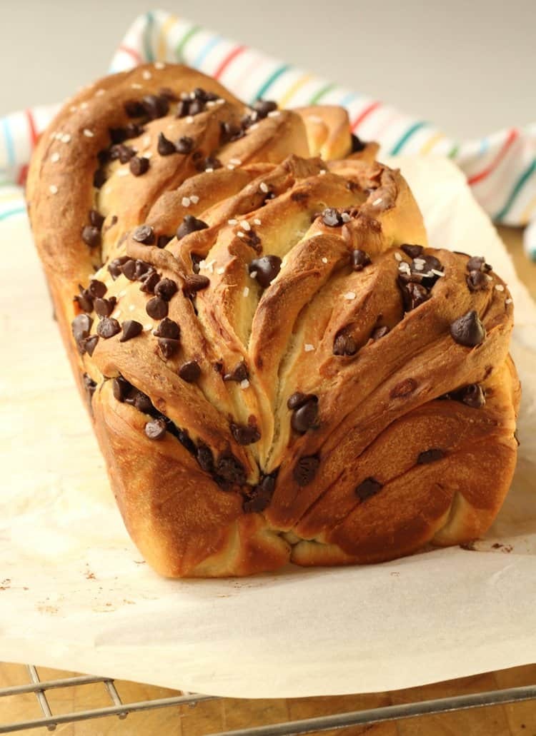Golden-brown brioche bread with melted chocolate chips