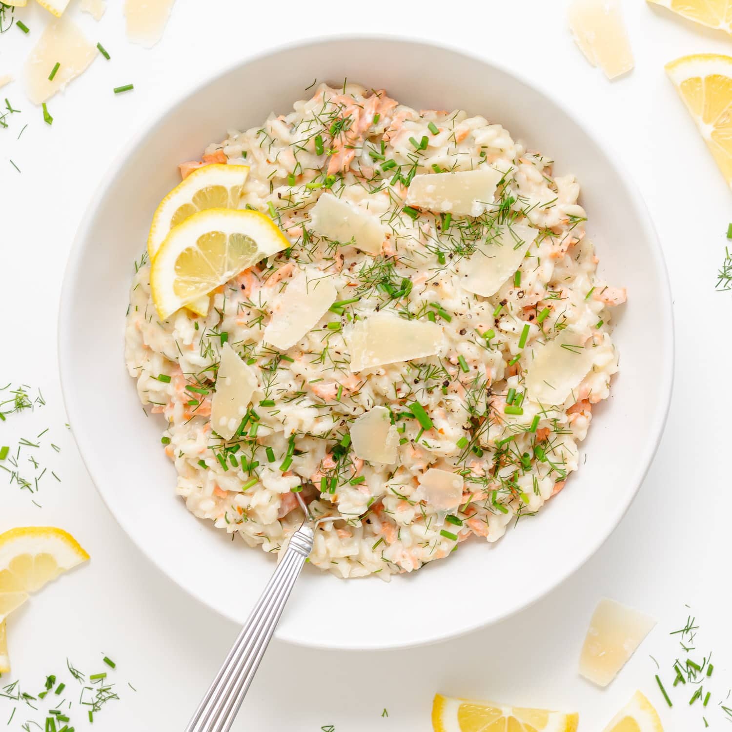 Smoked salmon risotto with parmesan cheese garnished with dill