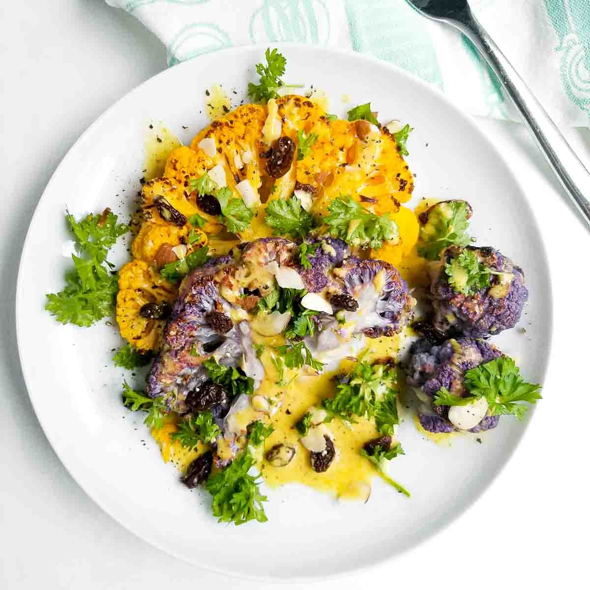 coconut curry glazed cauliflower steaks with toasted coconut garnish