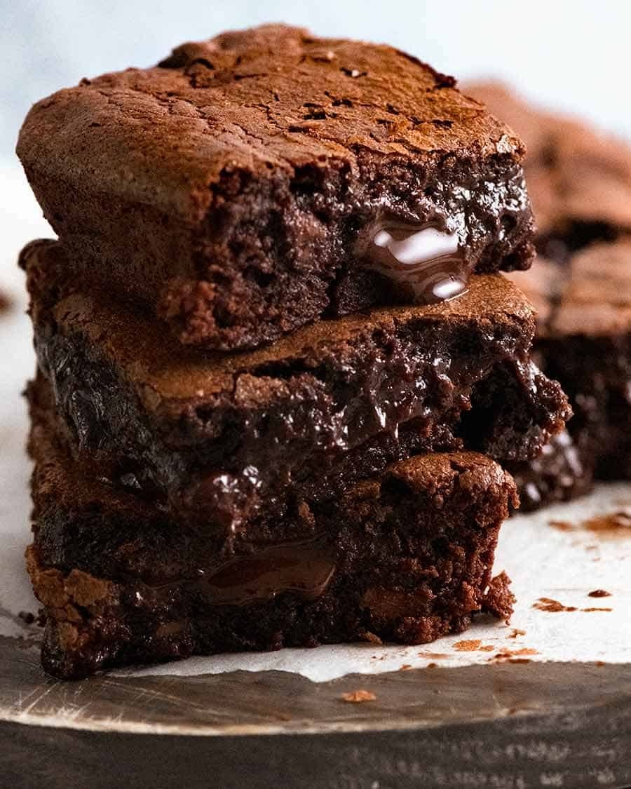 Gooey chocolate fudge brownie squares in a baking pan