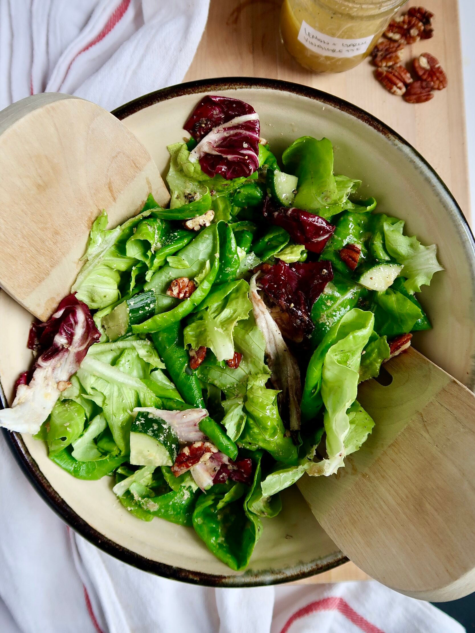 fresh salad drizzled with rosemary lemon vinaigrette