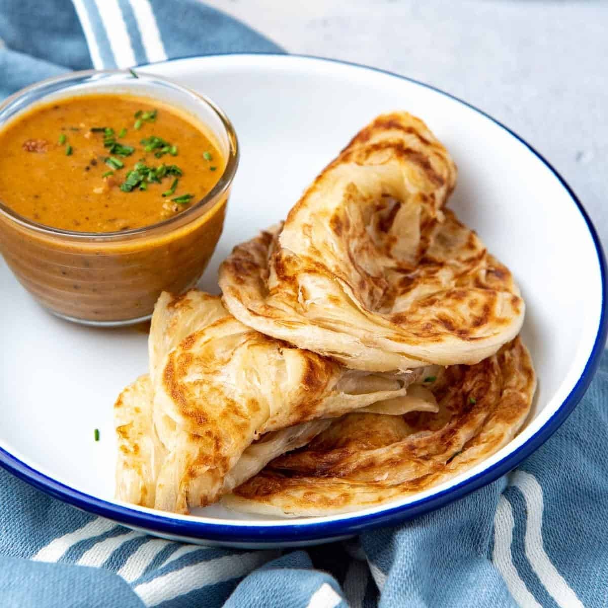 Golden brown roti with flavorful curry filling, ready to serve