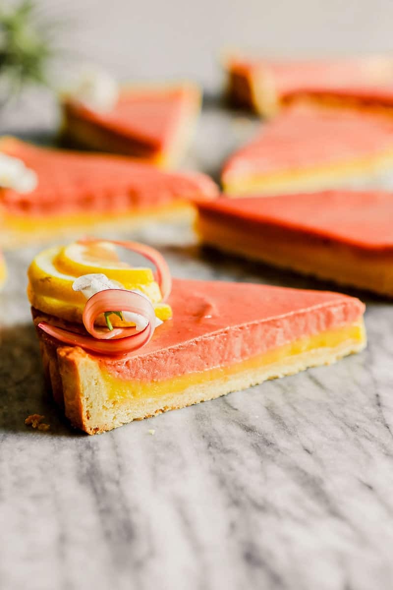 spring lemon rhubarb tart on a wooden table