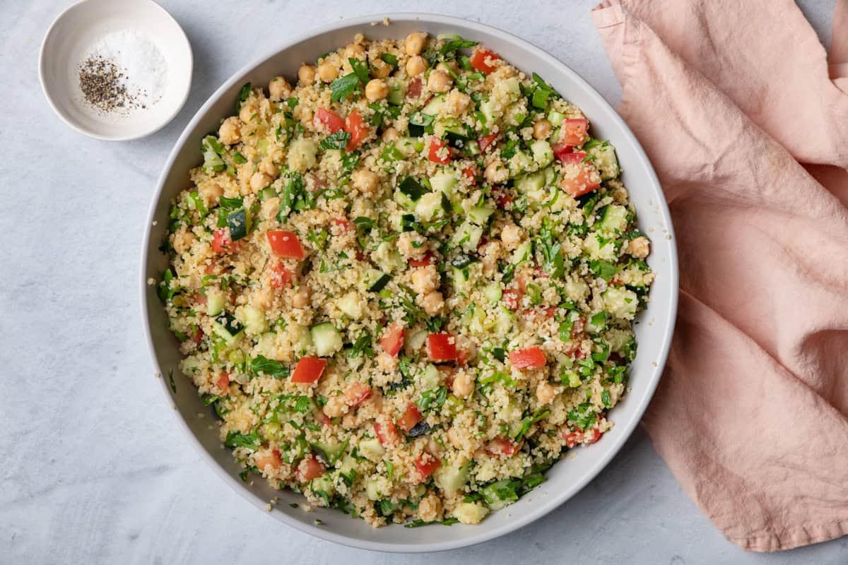 overhead view of the finished bulgur and chickpea salad in a serving bowl