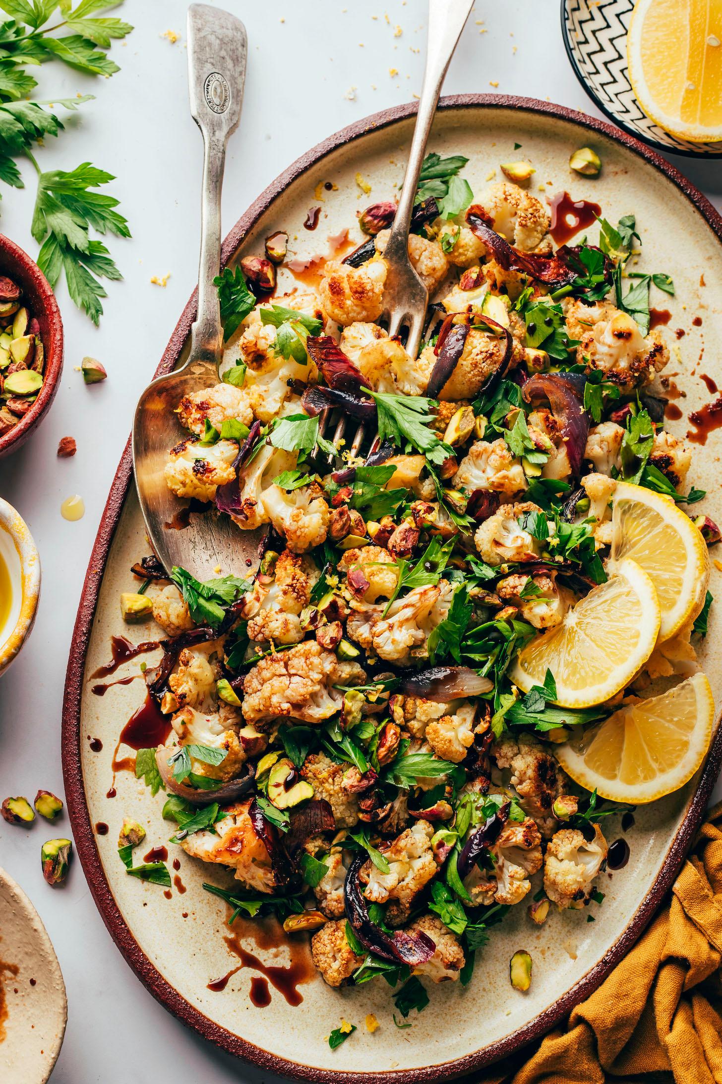 vibrant roasted cauliflower rice salad with toasted nuts and seeds, close-up shot