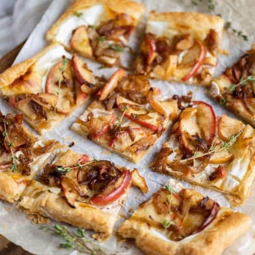 close up of sauerkraut and caramelized onion tart slices