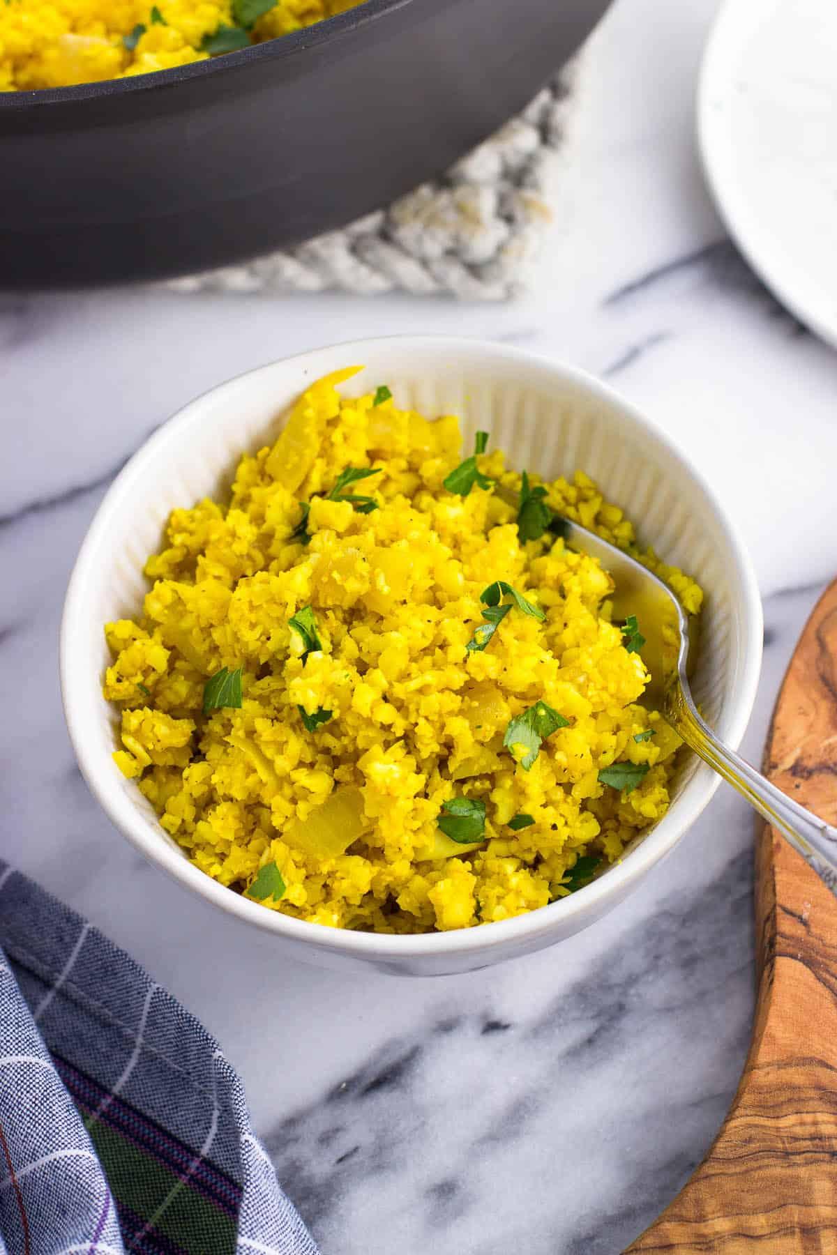 turmeric ginger cauliflower rice in a bowl